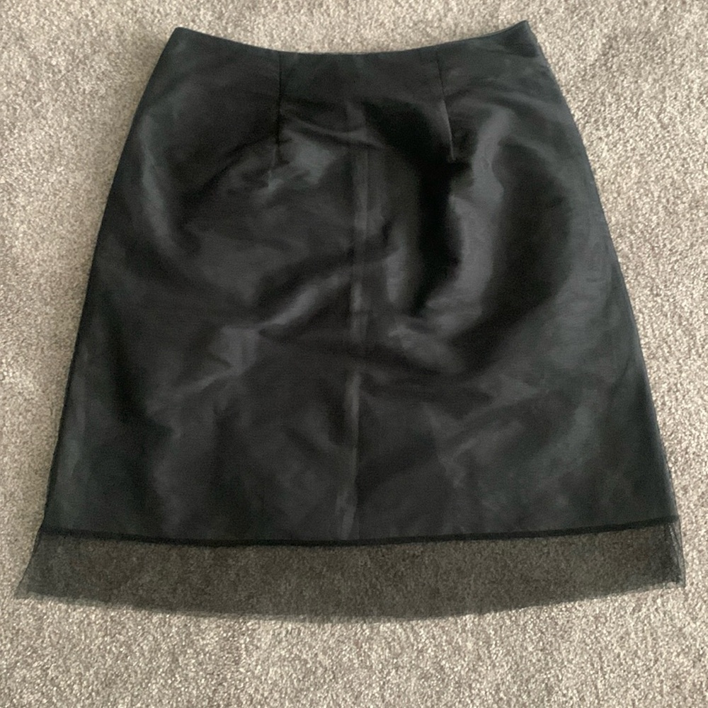 Metallic gray Beluva skirt with mesh overlay.